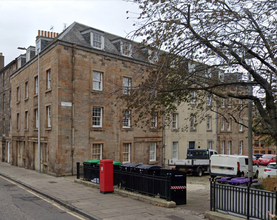 The former granary building, now North Leith Mill houses. Note the lintels above the former cart entrances.